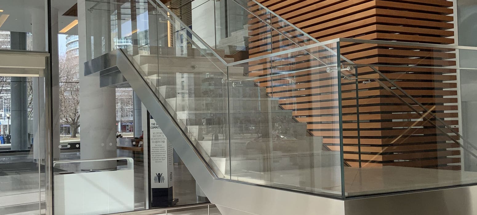 metal stairs with glass rail